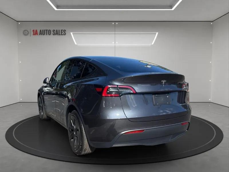 used 2025 Tesla Model Y car, priced at $39,495
