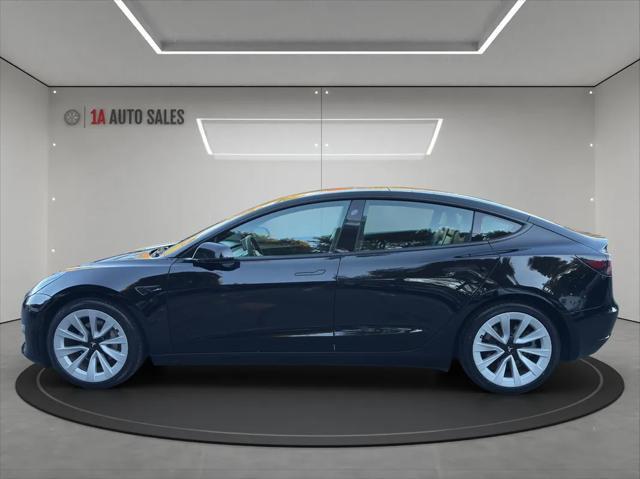 used 2022 Tesla Model 3 car, priced at $27,995