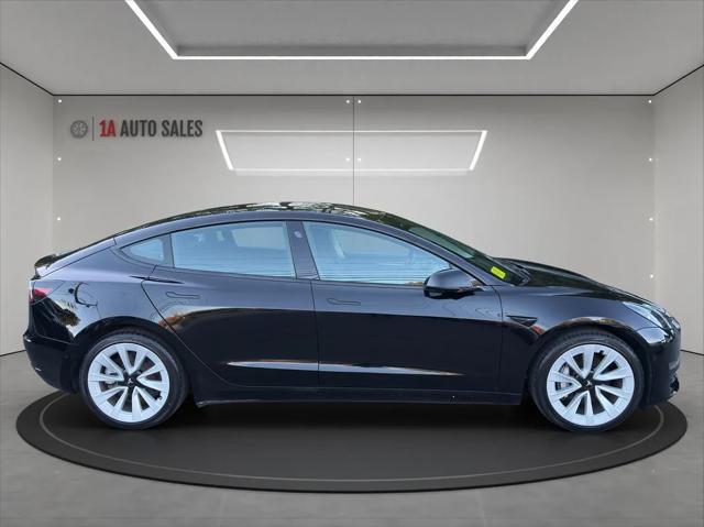 used 2022 Tesla Model 3 car, priced at $27,995