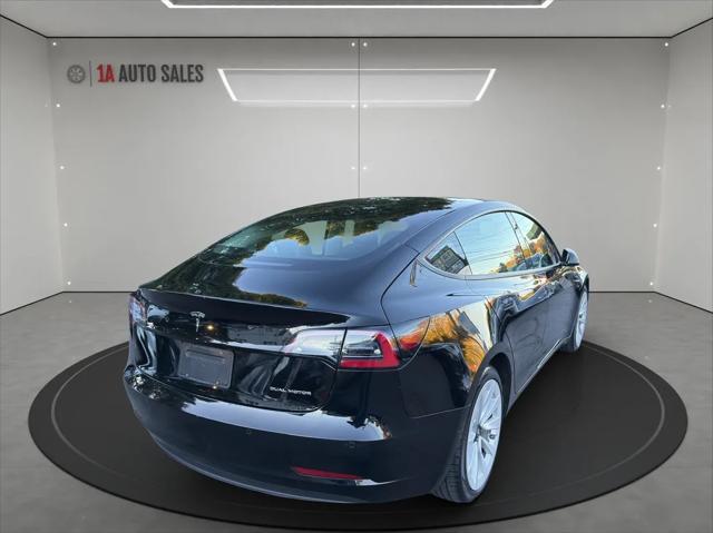 used 2022 Tesla Model 3 car, priced at $27,995