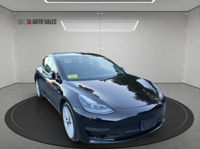 used 2022 Tesla Model 3 car, priced at $27,995