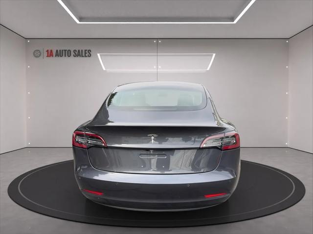 used 2018 Tesla Model 3 car, priced at $25,495