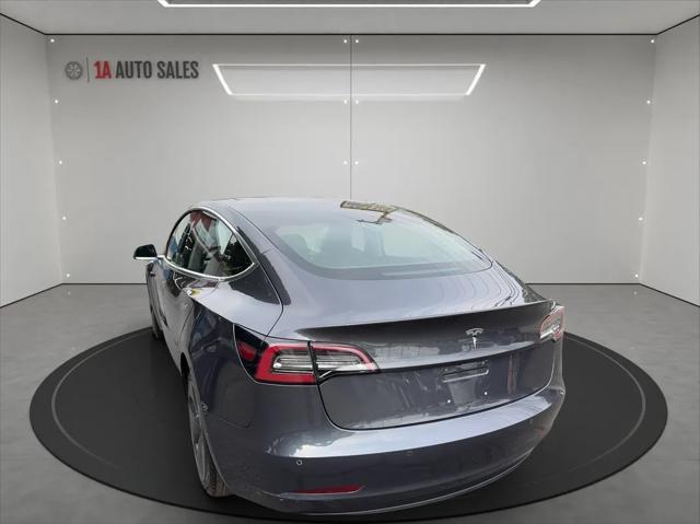 used 2018 Tesla Model 3 car, priced at $25,495