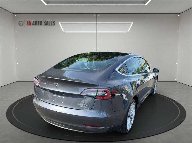 used 2018 Tesla Model 3 car, priced at $26,495