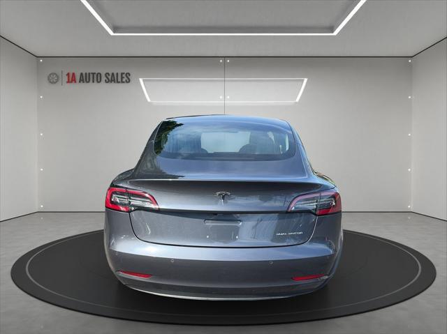 used 2018 Tesla Model 3 car, priced at $26,495