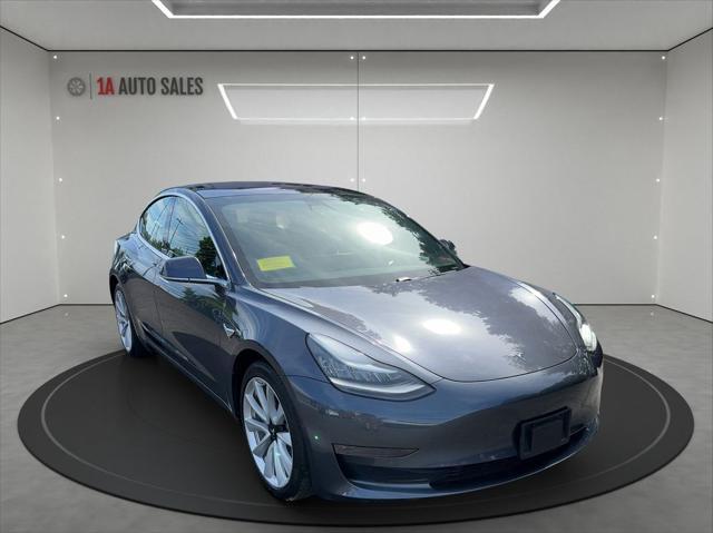 used 2018 Tesla Model 3 car, priced at $26,495