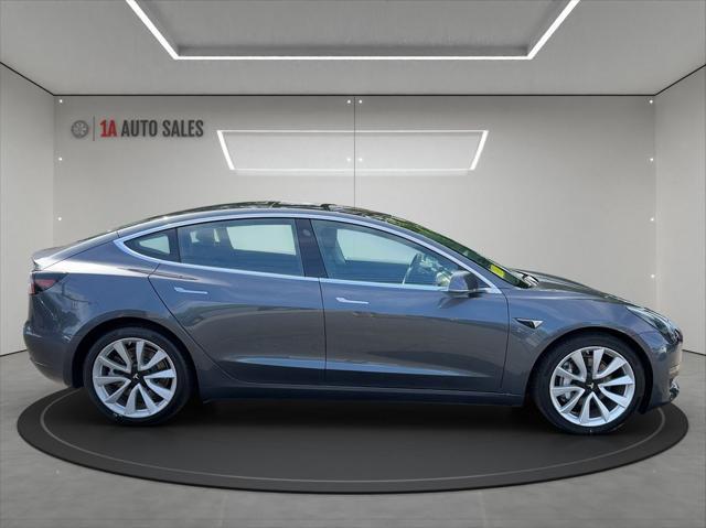 used 2018 Tesla Model 3 car, priced at $26,495