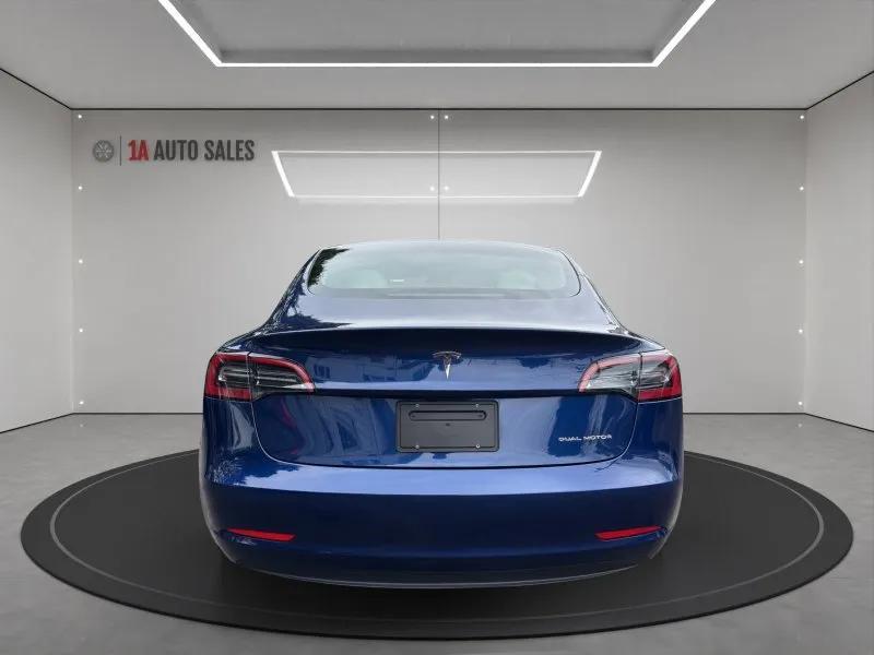 used 2023 Tesla Model 3 car, priced at $27,995