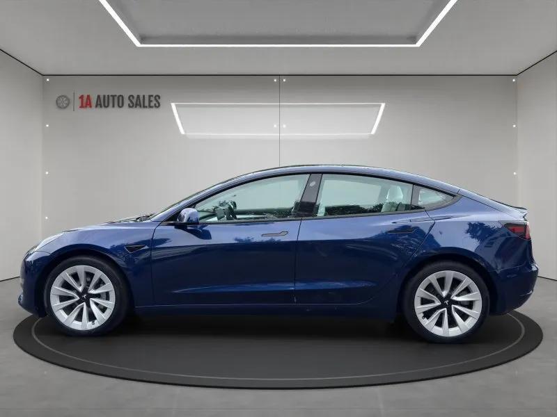 used 2023 Tesla Model 3 car, priced at $27,995
