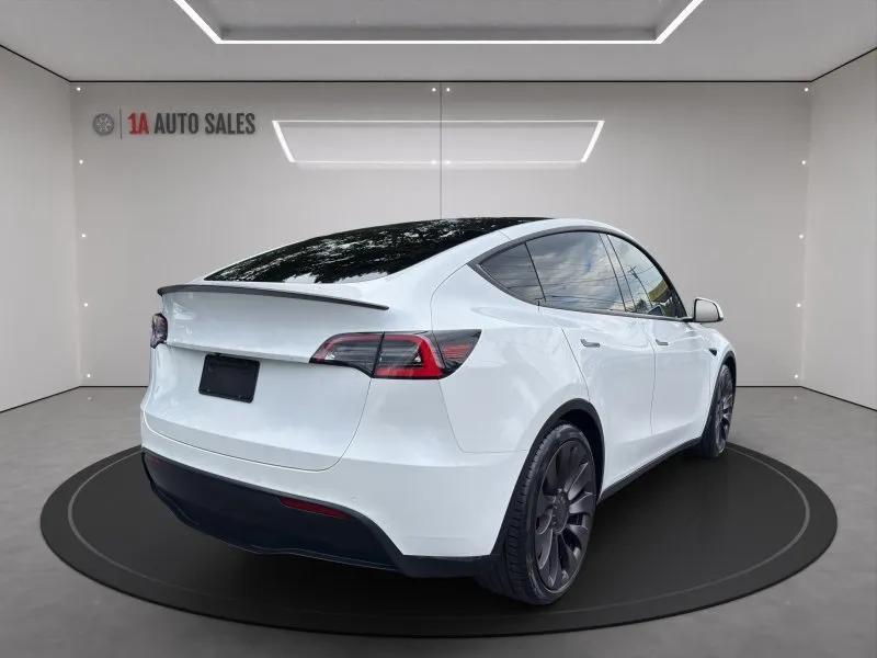 used 2021 Tesla Model Y car, priced at $16,995