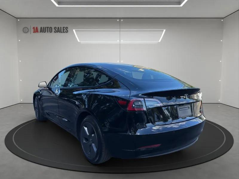 used 2022 Tesla Model 3 car, priced at $27,495