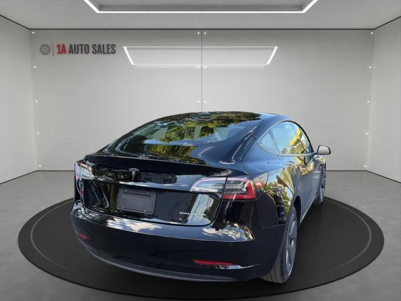used 2022 Tesla Model 3 car, priced at $27,495