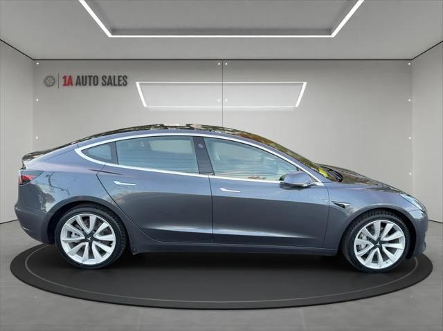 used 2018 Tesla Model 3 car, priced at $25,995