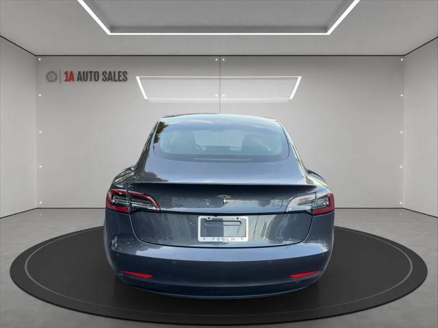 used 2018 Tesla Model 3 car, priced at $25,995