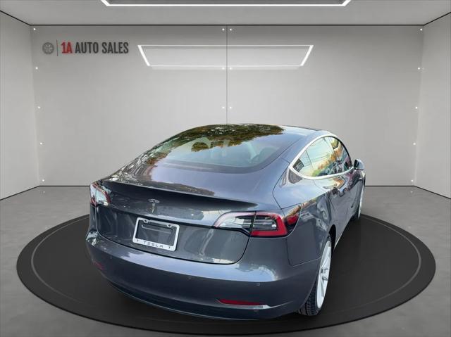 used 2018 Tesla Model 3 car, priced at $25,995