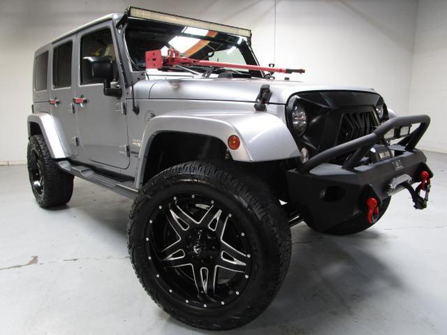 used 2015 Jeep Wrangler Unlimited car, priced at $21,995