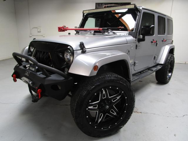 used 2015 Jeep Wrangler Unlimited car, priced at $21,995