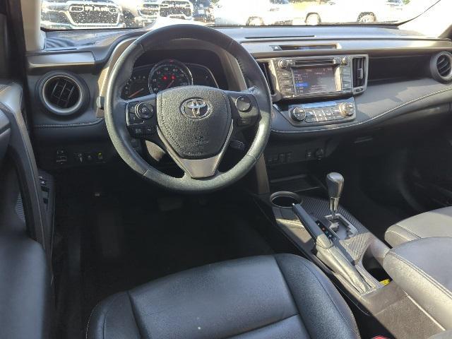 used 2014 Toyota RAV4 car, priced at $15,000