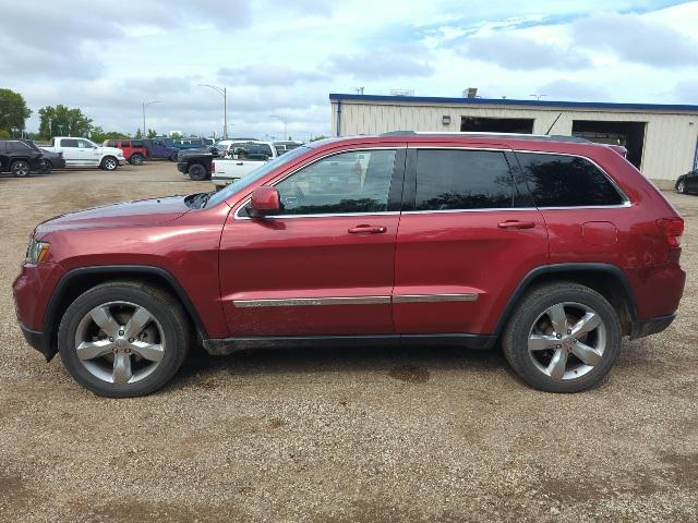 used 2011 Jeep Grand Cherokee car, priced at $6,000