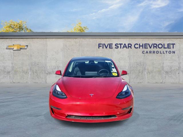 used 2023 Tesla Model 3 car, priced at $28,750