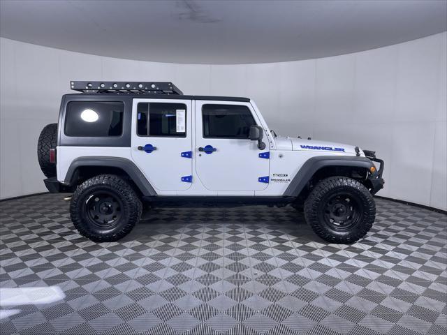 used 2013 Jeep Wrangler Unlimited car, priced at $17,400
