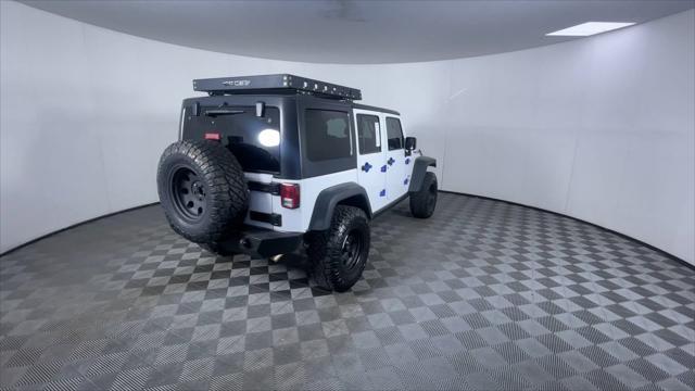 used 2013 Jeep Wrangler Unlimited car, priced at $17,400