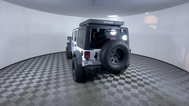 used 2013 Jeep Wrangler Unlimited car, priced at $17,400