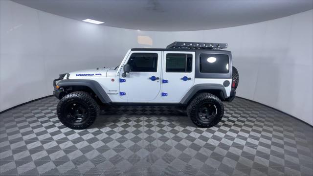 used 2013 Jeep Wrangler Unlimited car, priced at $17,400
