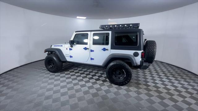 used 2013 Jeep Wrangler Unlimited car, priced at $17,400