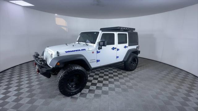 used 2013 Jeep Wrangler Unlimited car, priced at $17,400