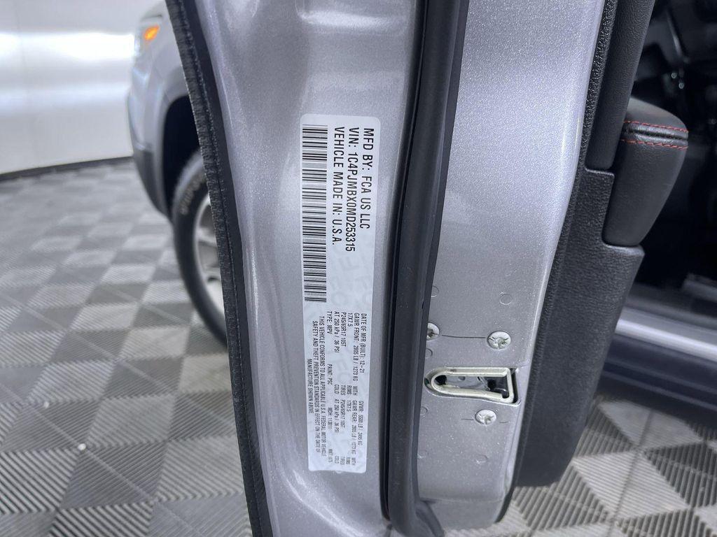 used 2021 Jeep Cherokee car, priced at $24,671