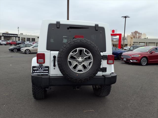 used 2013 Jeep Wrangler Unlimited car, priced at $18,998