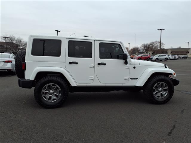 used 2013 Jeep Wrangler Unlimited car, priced at $18,998