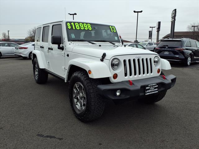 used 2013 Jeep Wrangler Unlimited car, priced at $18,998