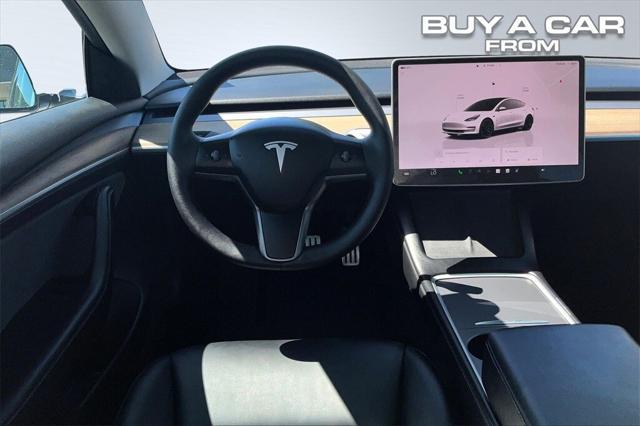 used 2023 Tesla Model 3 car, priced at $33,998