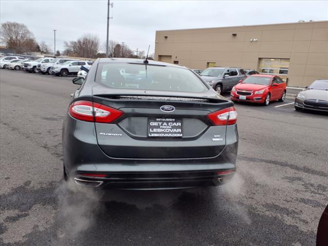 used 2016 Ford Fusion car, priced at $7,998