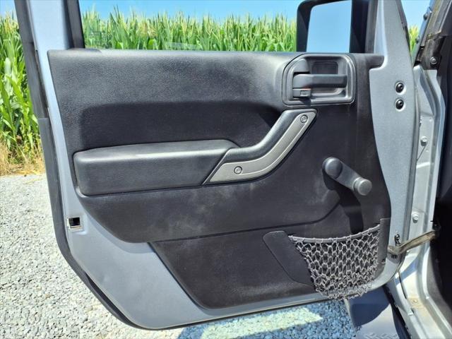 used 2015 Jeep Wrangler Unlimited car, priced at $15,824