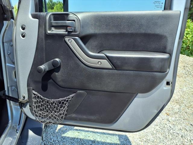 used 2015 Jeep Wrangler Unlimited car, priced at $15,824