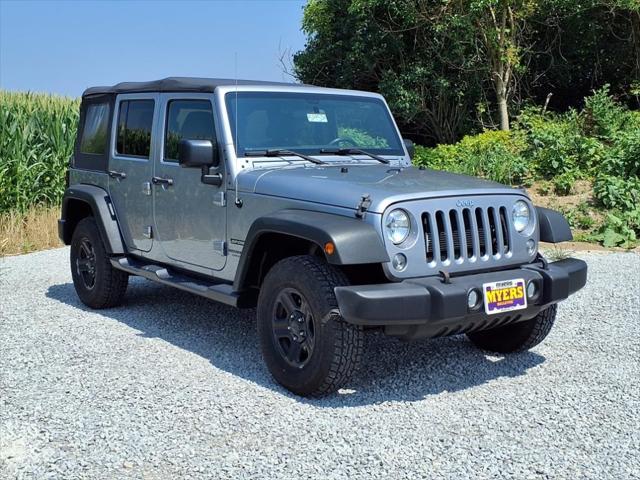 used 2015 Jeep Wrangler Unlimited car, priced at $15,824