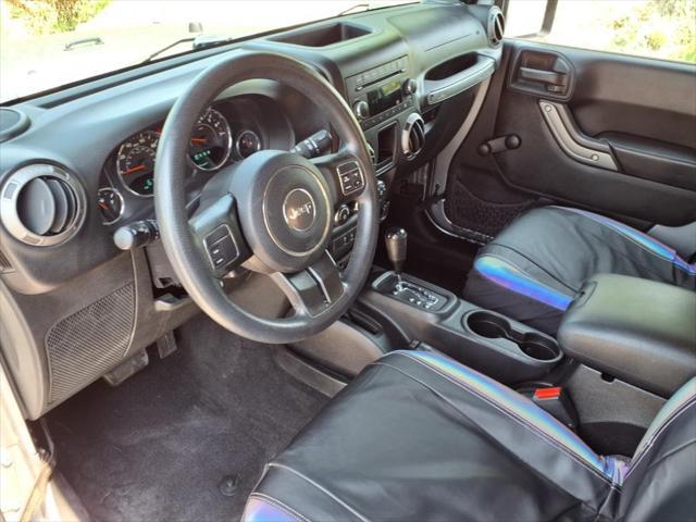 used 2015 Jeep Wrangler Unlimited car, priced at $15,824