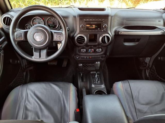 used 2015 Jeep Wrangler Unlimited car, priced at $15,824