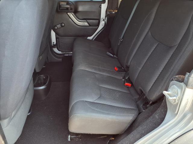 used 2015 Jeep Wrangler Unlimited car, priced at $15,824