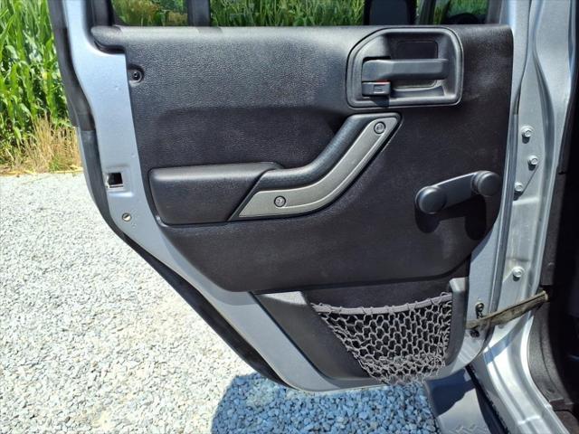 used 2015 Jeep Wrangler Unlimited car, priced at $15,824