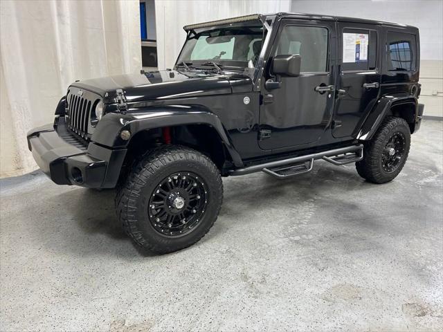 used 2014 Jeep Wrangler Unlimited car, priced at $18,171