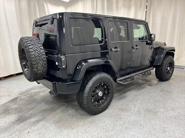 used 2014 Jeep Wrangler Unlimited car, priced at $18,171