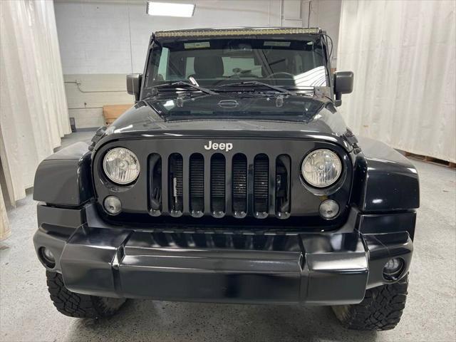 used 2014 Jeep Wrangler Unlimited car, priced at $18,171