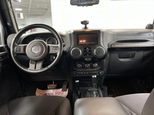 used 2014 Jeep Wrangler Unlimited car, priced at $18,171