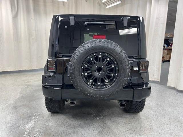 used 2014 Jeep Wrangler Unlimited car, priced at $18,171