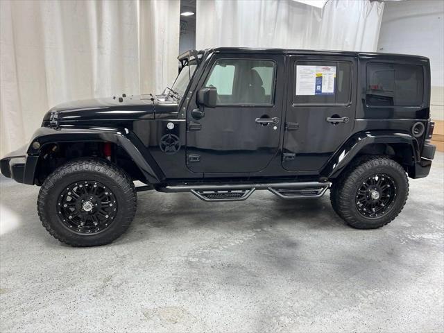 used 2014 Jeep Wrangler Unlimited car, priced at $18,171