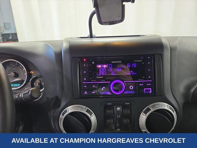 used 2016 Jeep Wrangler Unlimited car, priced at $13,089